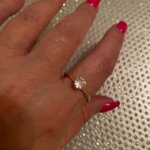 Elegant Gold Ring with Clear Stone